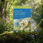 Livre bleu Découvrir le Sens Caché des Maladies du Dr Luc Bodin posé sur une souche moussue, illustré de fleurs de cerisier blanches sous une lumière printanière.