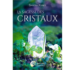 La Sagesse des Cristaux de Sandra Kynes, illustré par un grand cristal de roche translucide posé au cœur d'une végétation verdoyante.