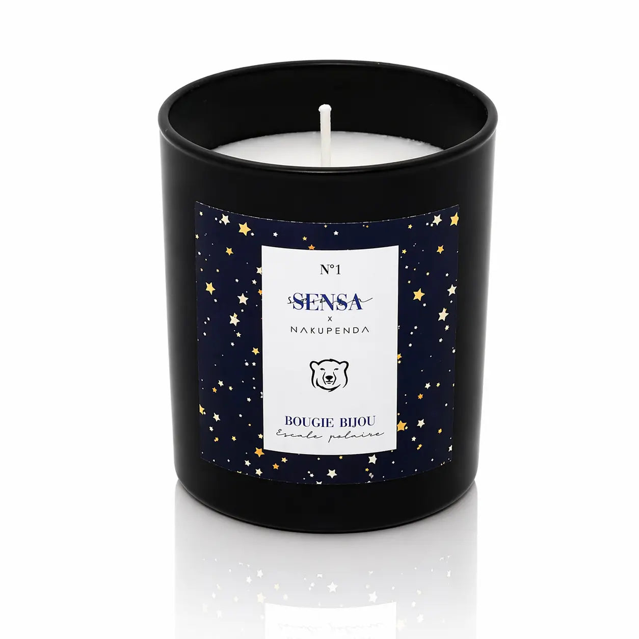 Bougie bijou Sensa x Nakupenda n°1 Escale Polaire dans un pot noir mat avec étiquette ciel étoilé.