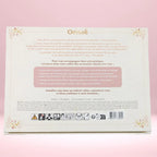 Coffret divination & intuition Omsaé avec pendule quartz rose, bougie blanche, palo santo et planches beiges.