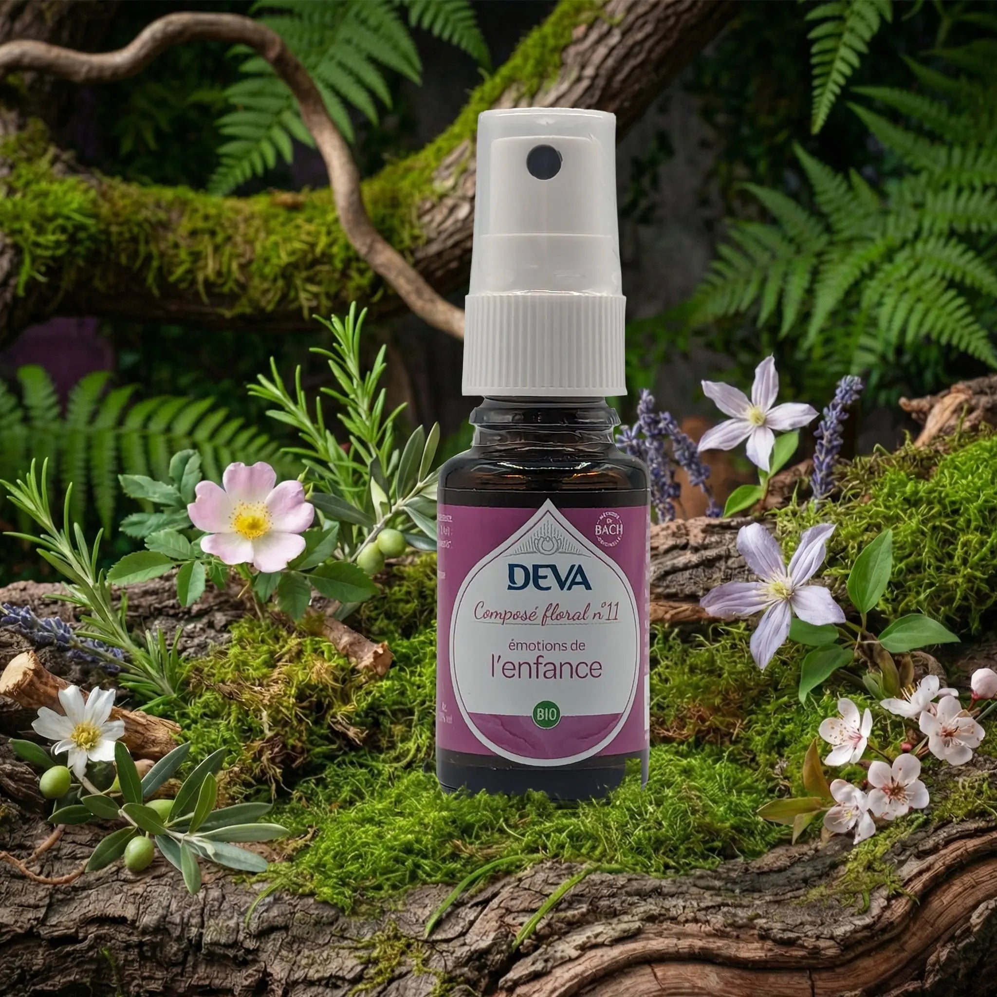 Flacon spray Deva - Composé Floral Dr Bach - Émotions de l'Enfance N.11 sur un lit de mousse et plantes sauvages.