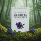Livre blanc Encyclopédie des Pierres Thérapeutiques de Michael Gienger posé sur une souche, illustré d'un majestueux amas de cristaux violets d'améthyste.