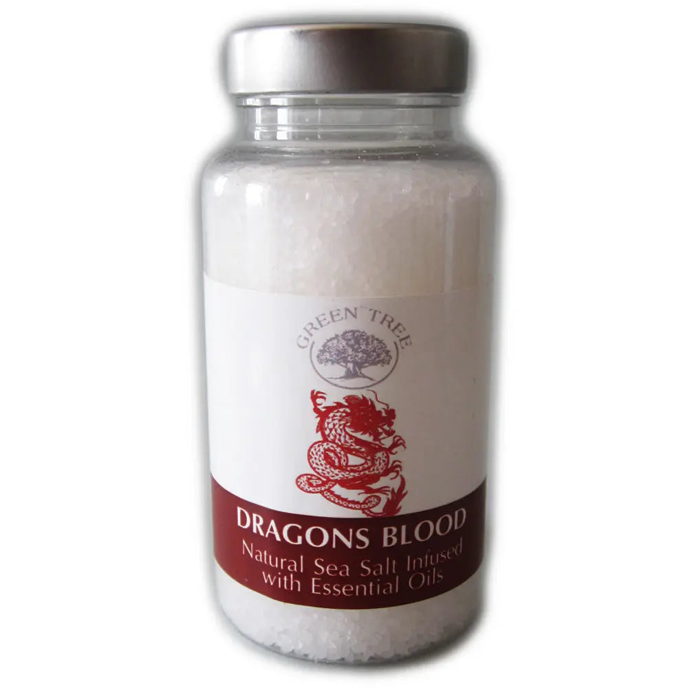 Flacon transparent Green Tree au bouchon argenté contenant des granulés de sel parfumé Dragon Blood blanc