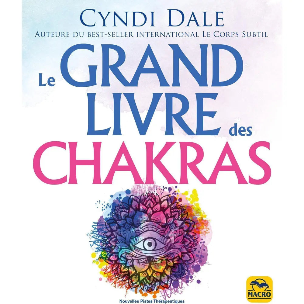 Le Grand Livre des chakras de Cyndi Dale, illustré en bas par un motif complexe de lotus orné d'un œil central sur une explosion d'aquarelles colorées, sous un titre écrit en bleu et rose.