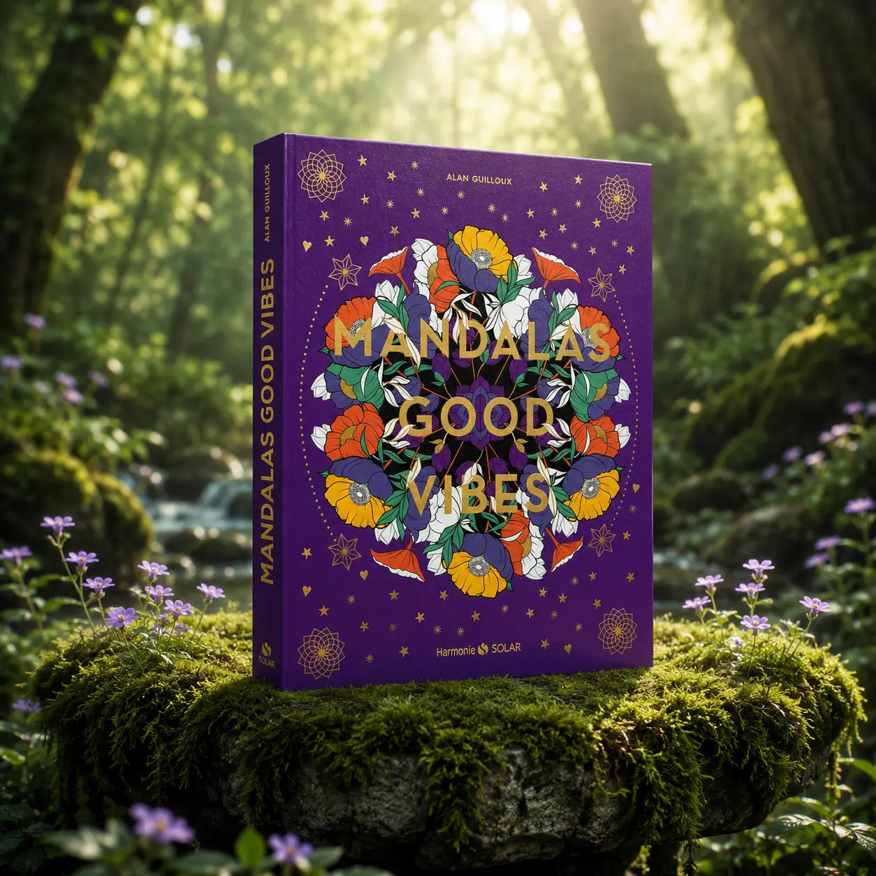 Livre Mandalas Good Vibes - Alan Guilloux sur mousse sacrée au pied d'un arbre, entouré de fleurs violettes sous des rayons de soleil magiques.