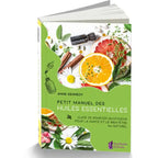 La couverture du livre Petit Manuel des Huiles Essentielles d'Anne Kennedy chez Améthyste Éditions illustre des agrumes, des fleurs et des flacons sur fond vert et blanc.